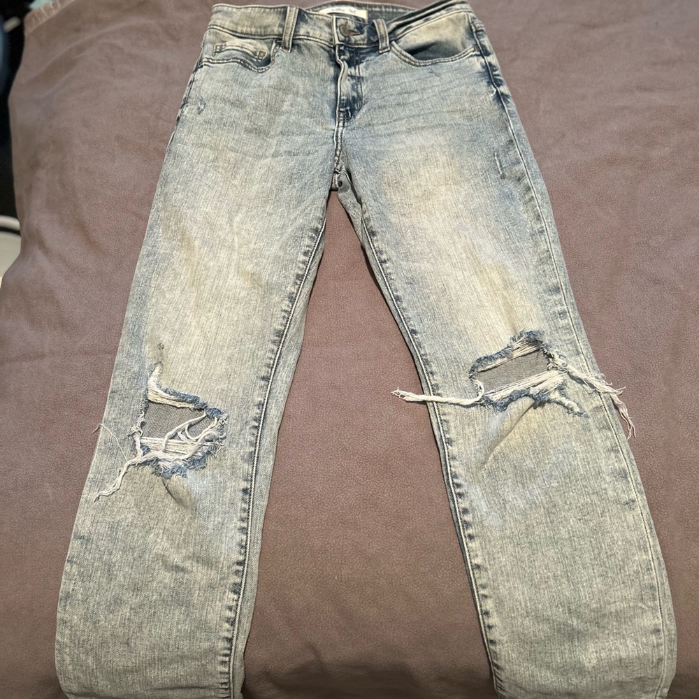 Buckle Light Blue Distressed Skinny Jeans